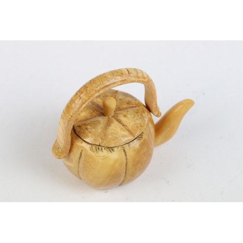 114 - Chinese bone teapot with lid and swinging handle