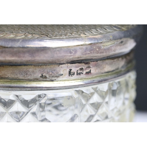 120 - A collection of three hallmarked silver topped cut glass vanity jars together with a collection of s... 