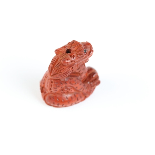 124 - Three miniature wood netsuke figures to include dragon, hen and peculiar face