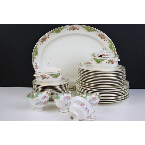 58 - Shelley green and floral tea set comprising of sugar bowl, milk jug, six tea cups and saucers, cake ... 