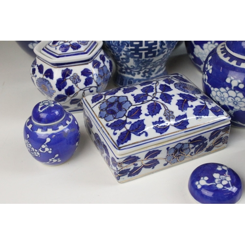 63 - Selection of blue and white ginger jars in varying shapes and sizes including cherry blossom and cha... 