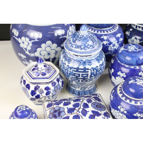 63 - Selection of blue and white ginger jars in varying shapes and sizes including cherry blossom and cha... 