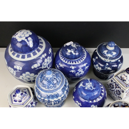 63 - Selection of blue and white ginger jars in varying shapes and sizes including cherry blossom and cha... 