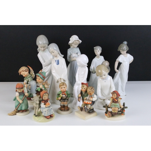 69 - Selection of Lladro Nao figurines to include dancing girl, girl with puppy, girl with blanket, child... 