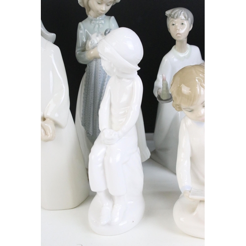 69 - Selection of Lladro Nao figurines to include dancing girl, girl with puppy, girl with blanket, child... 