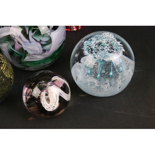 73 - Quantity of decorative paperweights to include Caithness 'Checkpoint', 'Moon crystal', 'Marquee', La... 