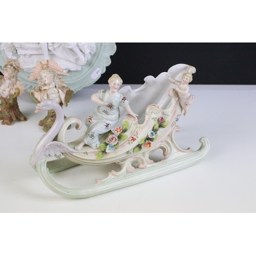 74 - Continental hand painted swan sleigh porcelain centrepiece figurine depicting a lady riding a swan, ... 