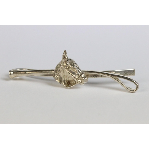 84 - Silver equestrian tie pin in the form of a horse head and whip, Birmingham hallmark, maker RJS