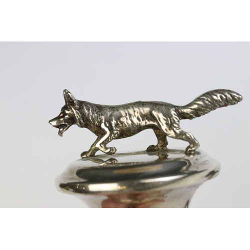 88 - Silver plated bottle stopper / cork mounted with a fox together with a pewter bottle stopper mounted... 