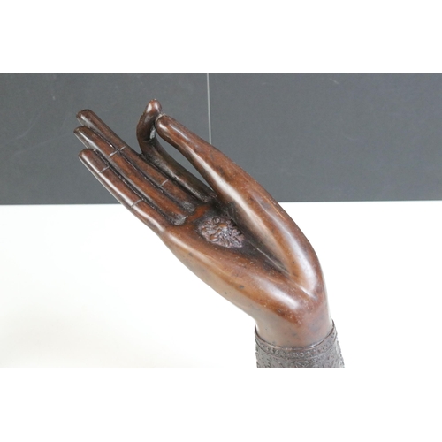 188 - Carved Buddha H 13cm and hand with bracelet figurine, H 24cm