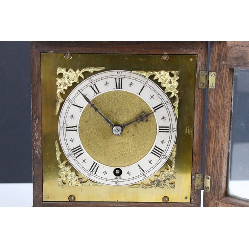 195 - Edwardian oak cased carved mantel clock with gilt detail to face, marked W&H to back of movement, H ... 