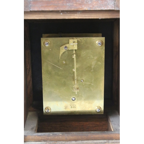 195 - Edwardian oak cased carved mantel clock with gilt detail to face, marked W&H to back of movement, H ... 