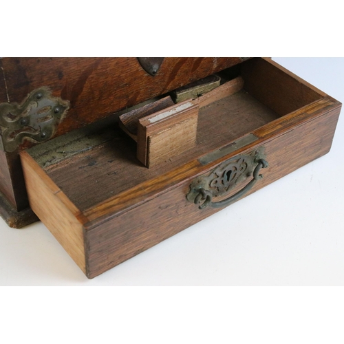 202 - Early 20th century oak smokers box with pierced fretwork, to include hallmarked 9ct gold collar cher... 