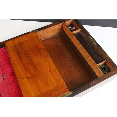 203 - Early 20th century wooden writing slope box with inlayed mother of pearl detail with an interior red... 