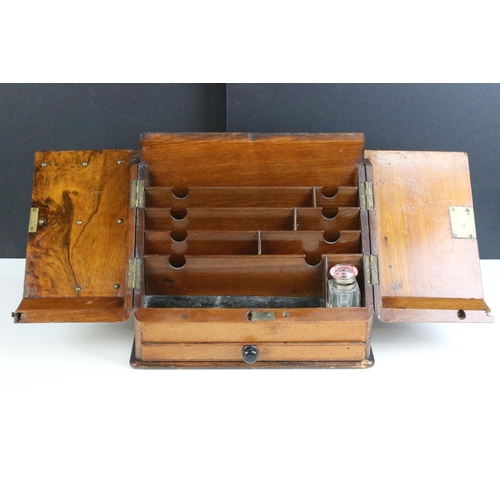 212 - Edwardian walnut stationary box featuring interior letter dividers, long drawer, pen rest and glass ... 