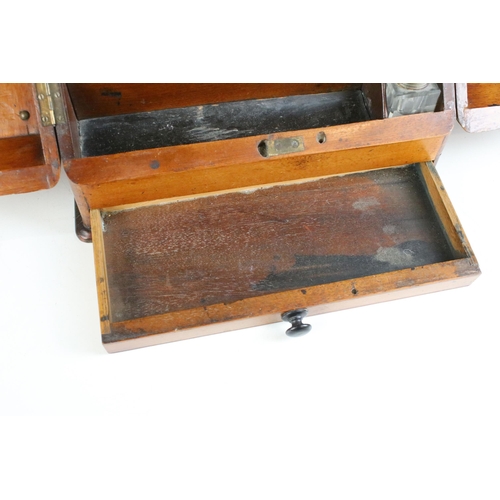 212 - Edwardian walnut stationary box featuring interior letter dividers, long drawer, pen rest and glass ... 