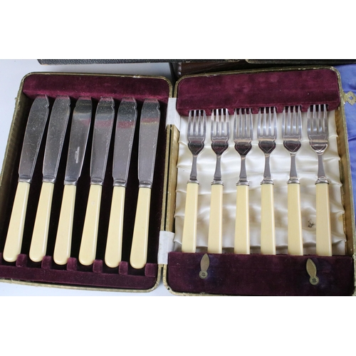 219 - Two canteens and a collection of boxed silver plate cutlery