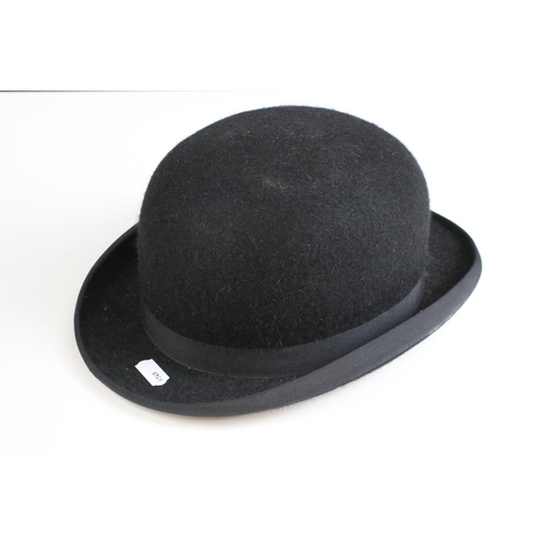 249 - Moss Bros grey top hat with black band together with a Ellwood & Sons collapsible black theatre top ... 