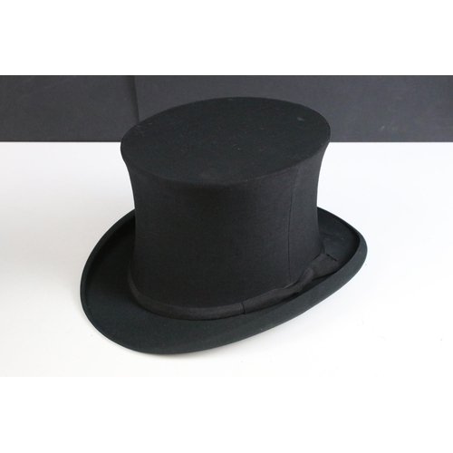 249 - Moss Bros grey top hat with black band together with a Ellwood & Sons collapsible black theatre top ... 