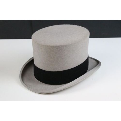 249 - Moss Bros grey top hat with black band together with a Ellwood & Sons collapsible black theatre top ... 