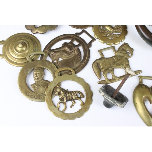 250 - WT&S cast iron lion's head mask door knocker together with a selection of horse brasses