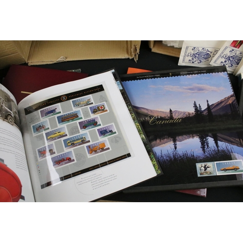 301 - Large collection of stamps and first day covers to include 1999 Royal Mail mint stamp book, two Cana... 