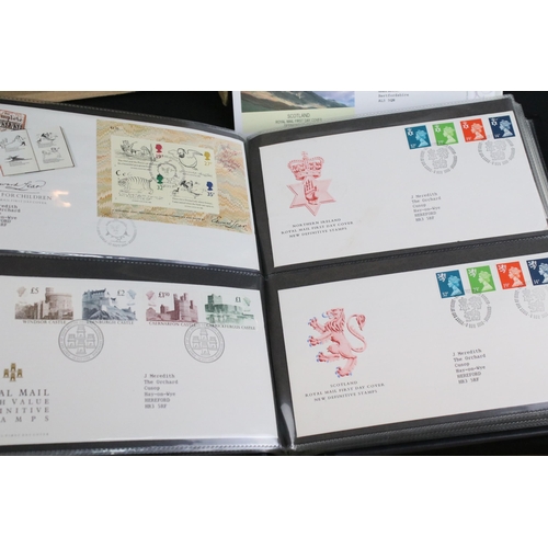 302 - Collection of late 20th and early 21st century first day covers within albums together with a collec... 