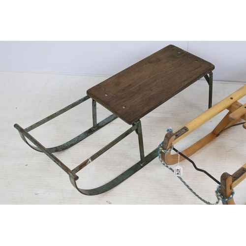 474 - Two 20th century wooden sledges, largest measures W 90cm