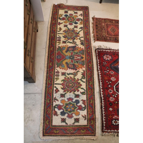 476 - Group of four rugs, one red ground example with three diamond pattern to centre, measures 124cm x 75... 