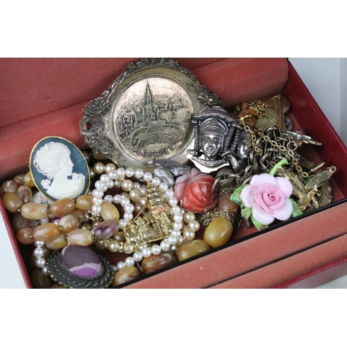 149A - Large collection of costume jewellery to include two silver charm bracelets, set of Guinness buttons... 