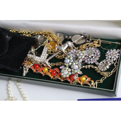 149A - Large collection of costume jewellery to include two silver charm bracelets, set of Guinness buttons... 