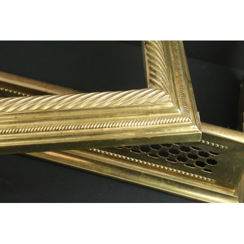 472 - Two 20th century brass fireplace fender guard surrounds, one with open work cut out design, W 102cm ... 