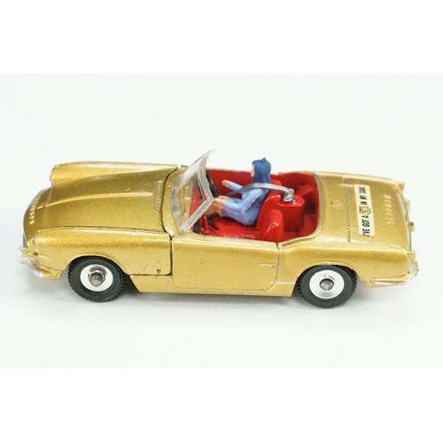 153A - Boxed Dinky 114 Triumph Spitfire diecast model in gold, with driver, diecast & decals vg, box with s... 