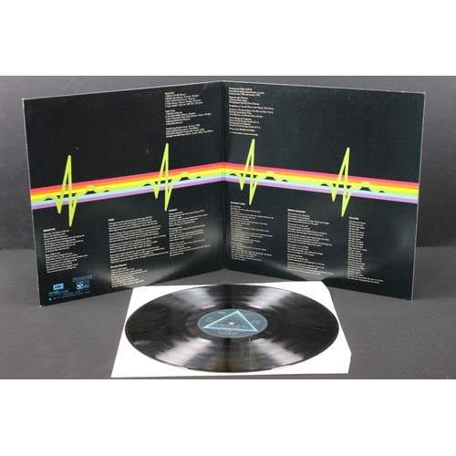 107 - Vinyl - 4 Pink Floyd LPs and a tour programme to include The Dark Side Of The Moon (French pressing)... 