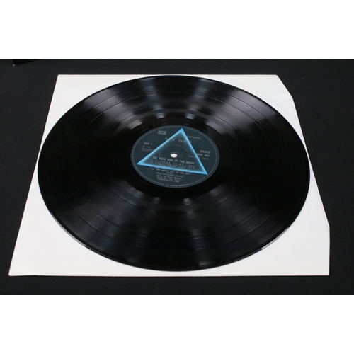 107 - Vinyl - 4 Pink Floyd LPs and a tour programme to include The Dark Side Of The Moon (French pressing)... 