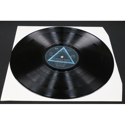 107 - Vinyl - 4 Pink Floyd LPs and a tour programme to include The Dark Side Of The Moon (French pressing)... 