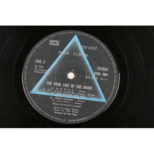 107 - Vinyl - 4 Pink Floyd LPs and a tour programme to include The Dark Side Of The Moon (French pressing)... 