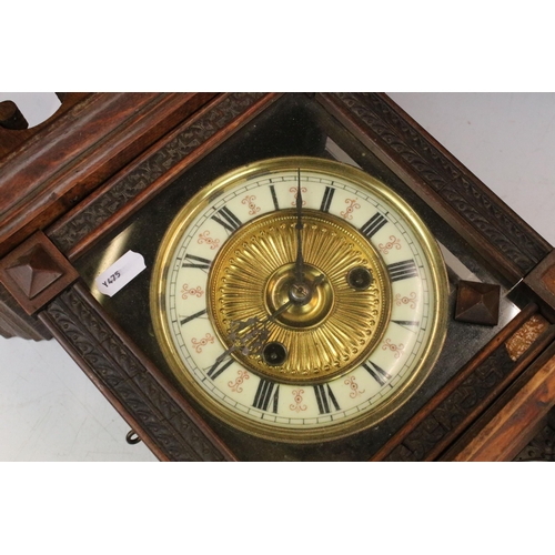 609A - late 19th century German wall clock having a circular dial inscribed with a chapter of Roman numeral... 