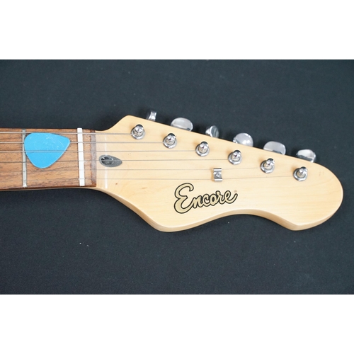 402 - Guitar - 2 stratocaster style electric guitars to include an Encore and an Elevation, both in black ... 