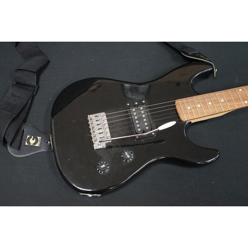 402 - Guitar - 2 stratocaster style electric guitars to include an Encore and an Elevation, both in black ... 