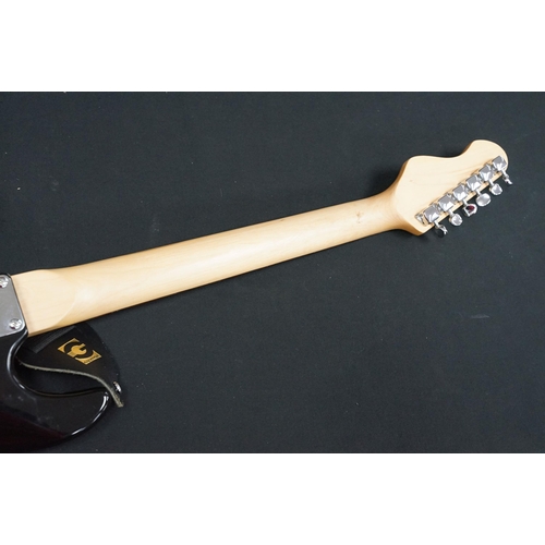 443A - Guitar - 2 stratocaster style electric guitars to include an Encore and an Elevation, both in black ... 