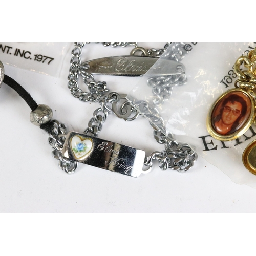 234 - A small collection of vintage Elvis Presley related costume jewellery.