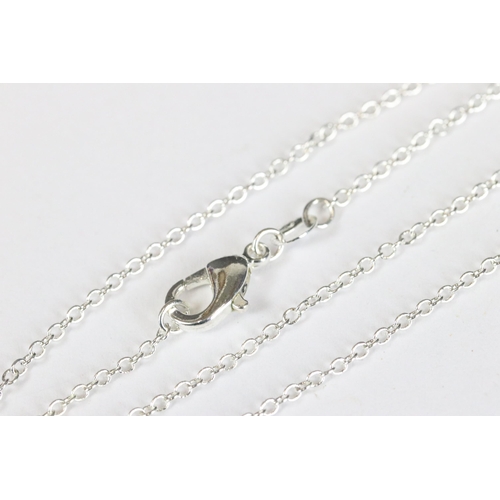 241 - Silver CZ and rubilite ring and pendant necklace