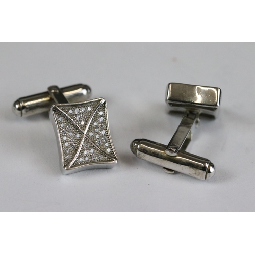 255 - Pair of silver and CZ cufflinks