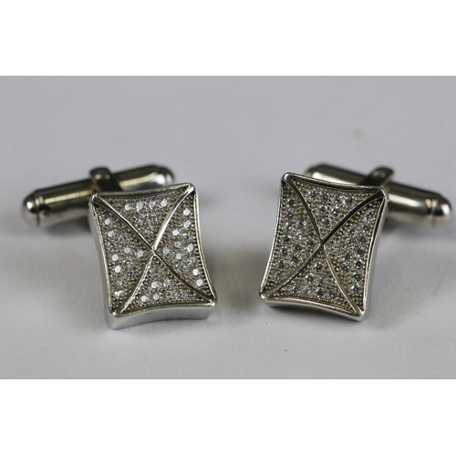 255 - Pair of silver and CZ cufflinks