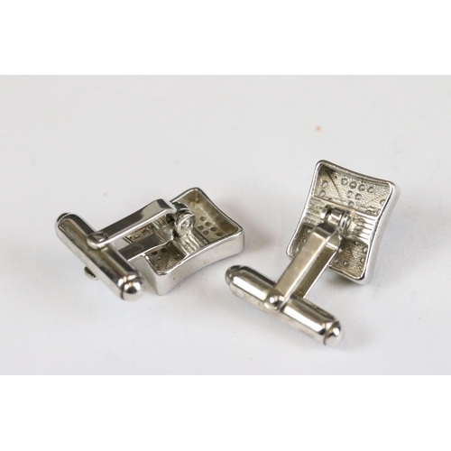 255 - Pair of silver and CZ cufflinks