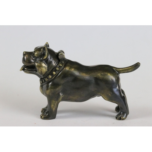 256 - Brass cased dog vesta