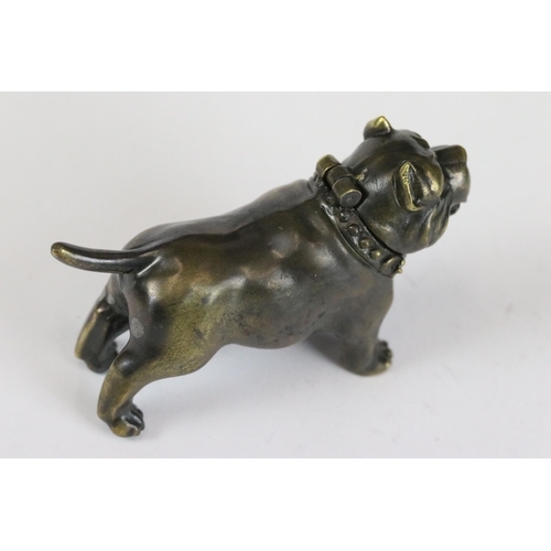 256 - Brass cased dog vesta