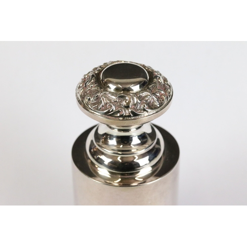 263 - A silver plated English made paperweight of traditional form.