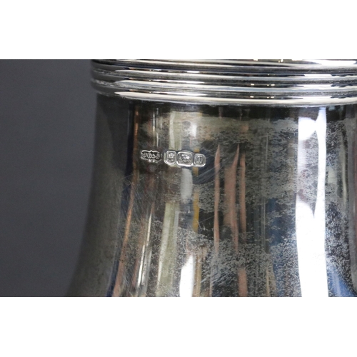 268 - A large fully hallmarked sterling silver sugar shaker, assay marked for Sheffield, maker marked for ... 